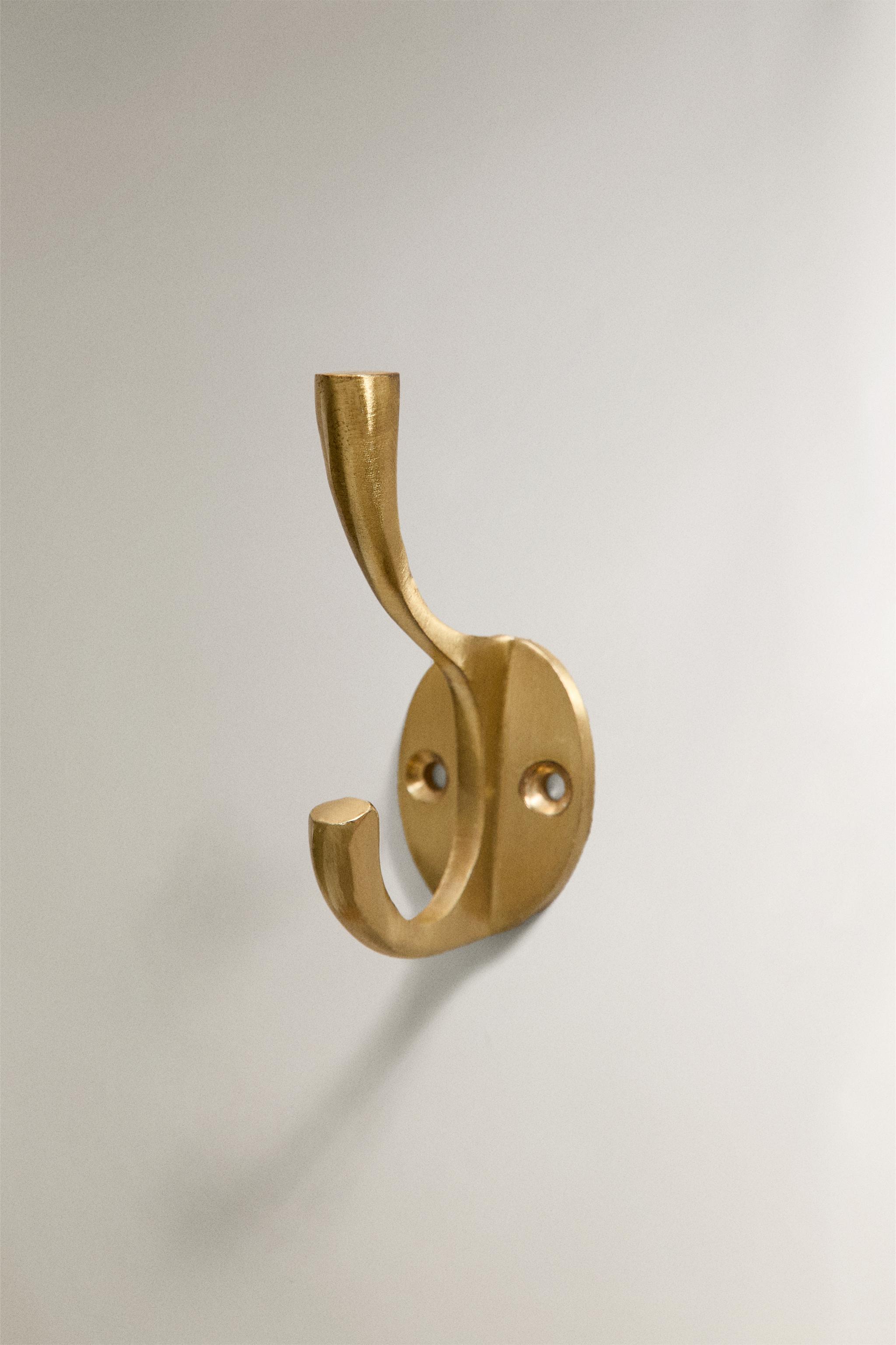 PORTE-MANTEAU MÉTALLIQUE DORÉ